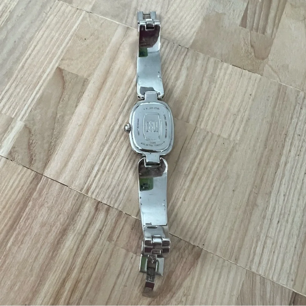 Esq by Movado ladies black dial silver tone dress watch NEW BATTERY